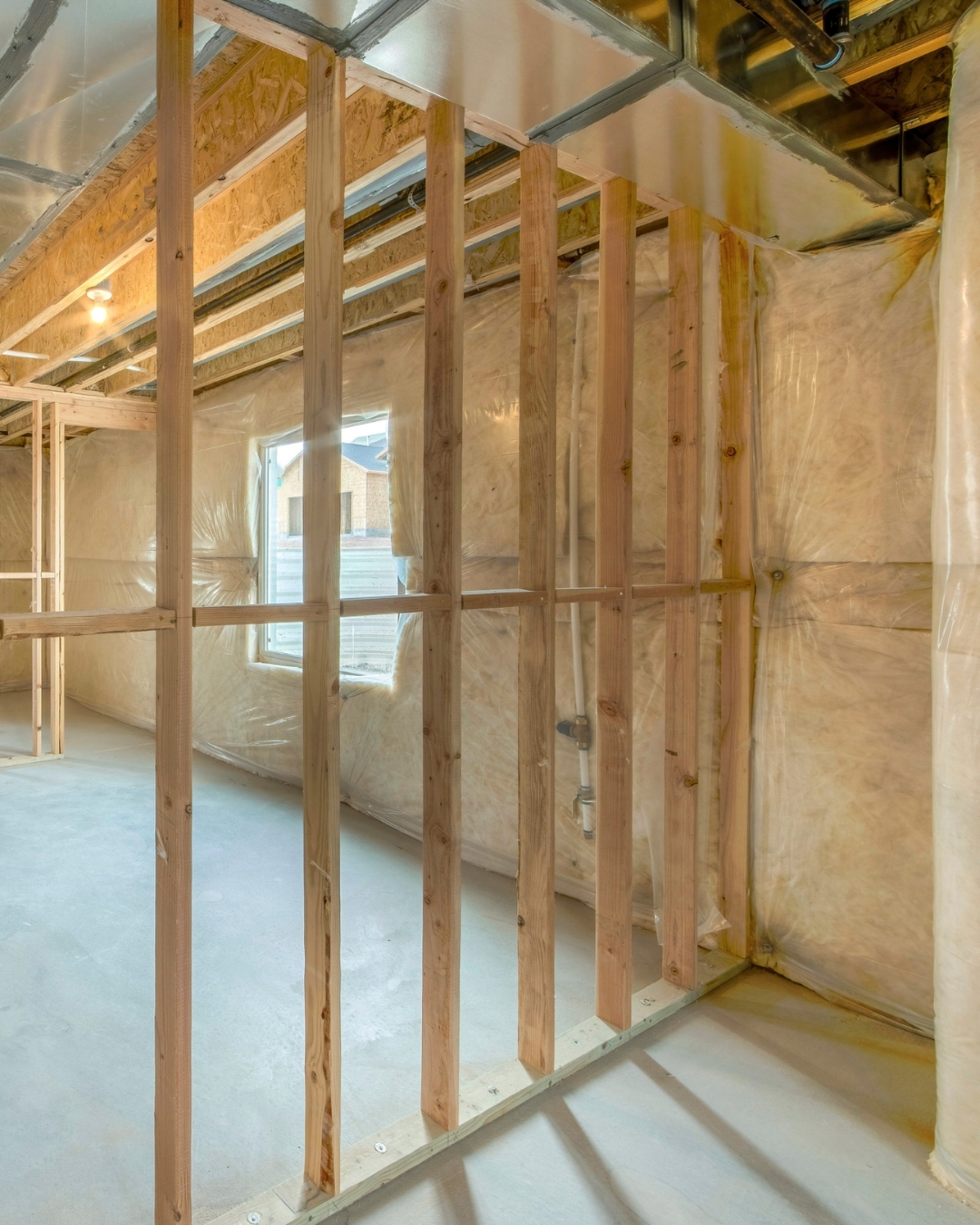 Wood wall framing inside a home renovation project in Edmonton