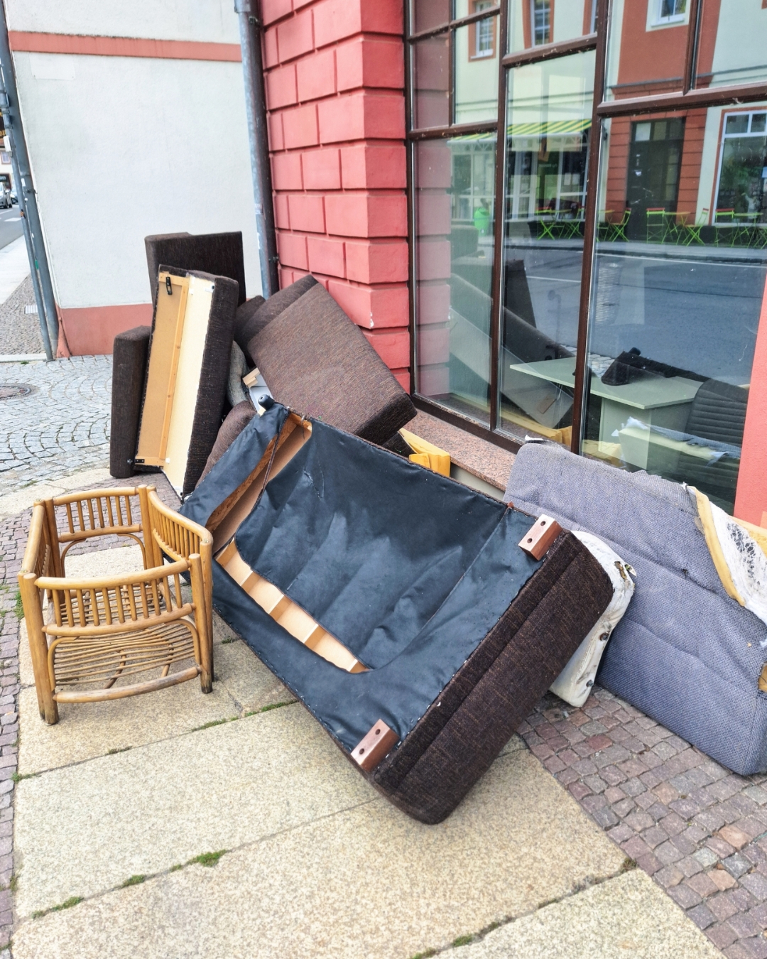 Abandoned furniture and tenant junk waiting for removal in Edmonton